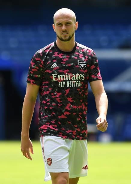 Rob Holding of Arsenal warms up before during the pre season match between Glasgow Rangers and Arsenal at Ibrox Stadium on July 17, 2021 in Glasgow,...
