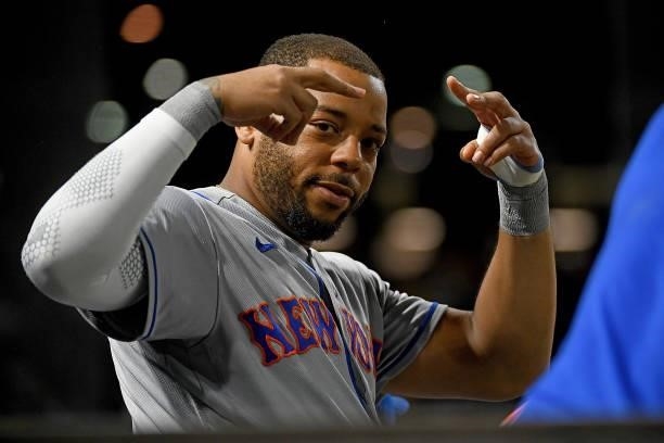 Dominic Smith of the New York Mets looks on from the dugout during the game against the Pittsburgh Pirates at PNC Park on July 16, 2021 in...