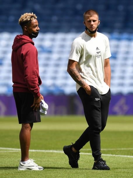 Omari Hutchinson and Harry Clarke of Arsenal before the pre season match between Glasgow Rangers and Arsenal at Ibrox Stadium on July 17, 2021 in...