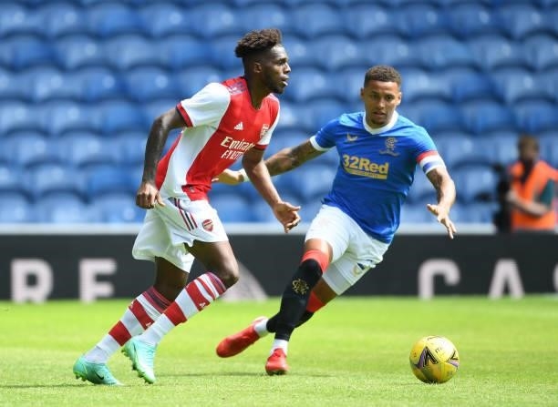 Nuno Tavares of Arsenal breaks past James Tavernier of Rangers during the pre season friendly between Rangers and Arsenal at Ibrox Stadium on July...