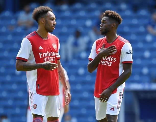Pierre-Emerick Aubameyang and Nuno Taraves of Arsenal during the pre season friendly between Rangers and Arsenal at Ibrox Stadium on July 17, 2021 in...