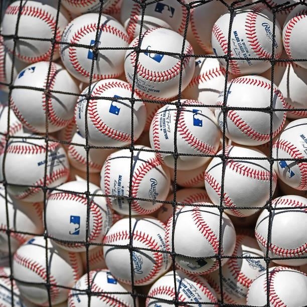 Detailed view of major league balls used for batting practice by the the Seattle Mariners for the game against the Los Angeles Angels at Angel...