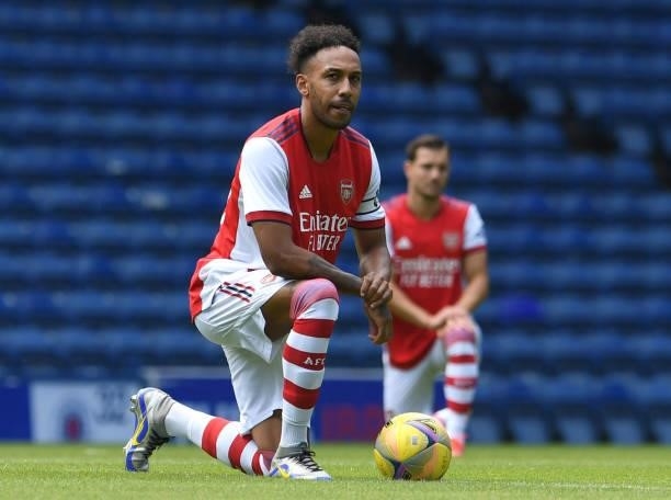 Pierre-Emerick Aubameyang of Arsenal takes the knee the pre season match between Glasgow Rangers and Arsenal at Ibrox Stadium on July 17, 2021 in...