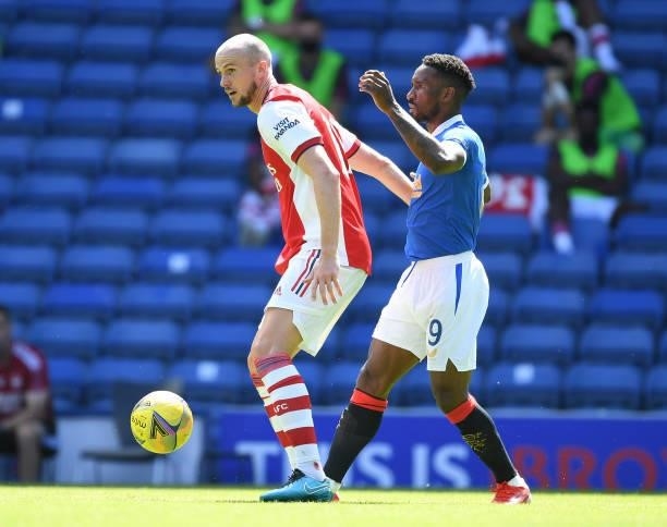 Rob Holding of Arsenal holds off Jermain Defoe of Rangers during the pre season friendly between Rangers and Arsenal at Ibrox Stadium on July 17,...