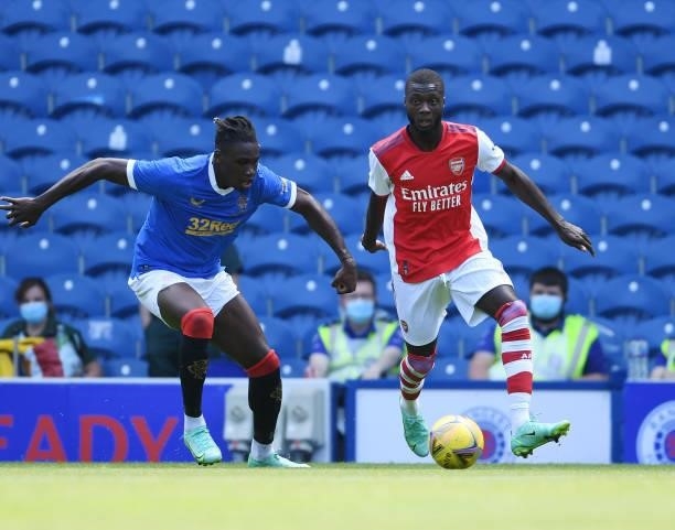 Nicolas Pepe of Arsenal takes on Calvin Bassey of Rangers during the pre season friendly between Rangers and Arsenal at Ibrox Stadium on July 17,...