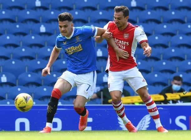 Cedric Soares of Arsenal closes down Ianis Hagi of Rangers during the pre season match between Glasgow Rangers and Arsenal at Ibrox Stadium on July...