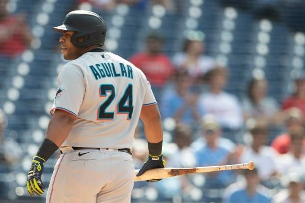 Jesus Aguilar of the Miami Marlins looks on against the Philadelphia Phillies during Game One of the doubleheader at Citizens Bank Park on July 16,...