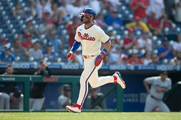 Bryce Harper of the Philadelphia Phillies runs home against the Miami Marlins during Game One of the doubleheader at Citizens Bank Park on July 16,...