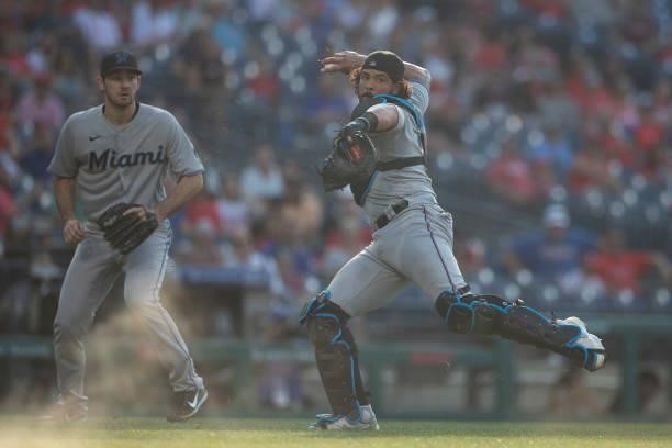 Jorge Alfaro of the Miami Marlins throws the ball to first base against the Philadelphia Phillies during Game One of the doubleheader at Citizens...