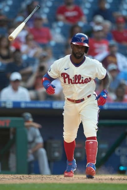 Andrew McCutchen of the Philadelphia Phillies flips his bat against the Miami Marlins during Game One of the doubleheader at Citizens Bank Park on...