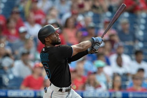 Starling Marte of the Miami Marlins hits a two run home run in the top of the first inning against the Philadelphia Phillies during Game Two of the...