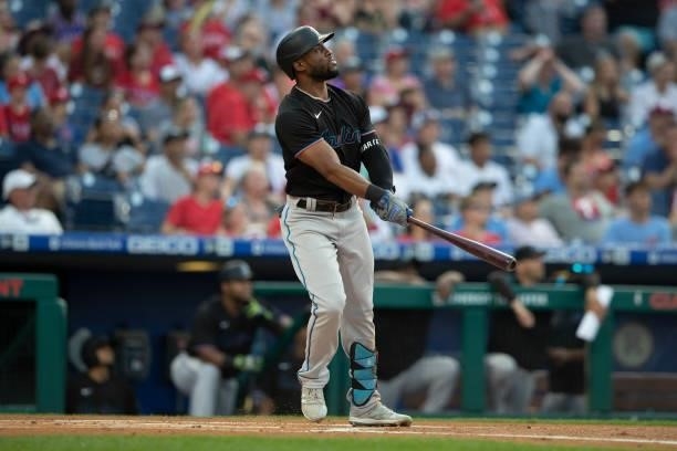 Starling Marte of the Miami Marlins hits a two run home run in the top of the first inning against the Philadelphia Phillies during Game Two of the...