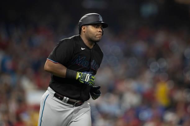 Jesus Aguilar of the Miami Marlins rounds the bases after hitting a three run home run in the top of the fourth inning against the Philadelphia...