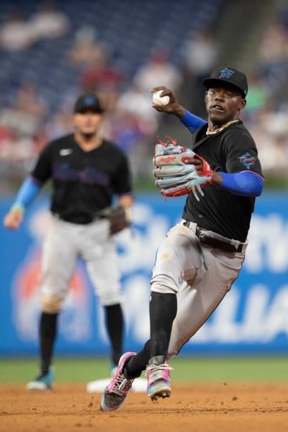 Jazz Chisholm Jr. #2 of the Miami Marlins throws the ball to first base against the Philadelphia Phillies during Game Two of the doubleheader at...