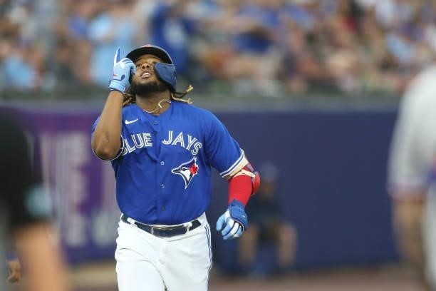 Vladimir Guerrero Jr. #27 of the Toronto Blue Jays celebrates hitting a home run during the first inning against the Texas Rangers at Sahlen Field on...