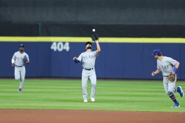 Isiah Kiner-Falefa of the Texas Rangers makes a catch during the second inning against the Toronto Blue Jays at Sahlen Field on July 16, 2021 in...