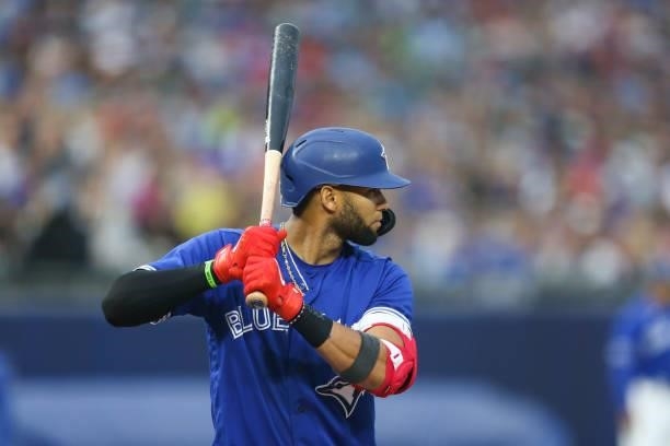 Lourdes Gurriel Jr. #13 of the Toronto Blue Jays at bat during the second inning against the Texas Rangers at Sahlen Field on July 16, 2021 in...