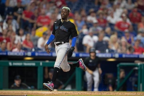 Jazz Chisholm Jr. #2 of the Miami Marlins scores a run against the Philadelphia Phillies during Game Two of the doubleheader at Citizens Bank Park on...