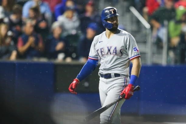 Joey Gallo of the Texas Rangers reacts after striking out during the sixth inning against the Toronto Blue Jays at Sahlen Field on July 16, 2021 in...