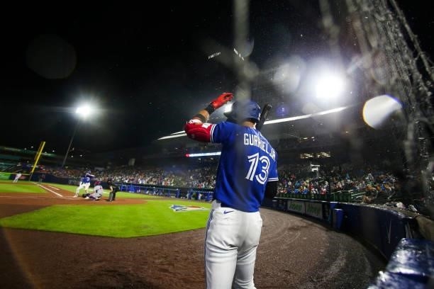 Lourdes Gurriel Jr. #13 of the Toronto Blue Jays stands on deck during the seventh inning against the Texas Rangers at Sahlen Field on July 16, 2021...