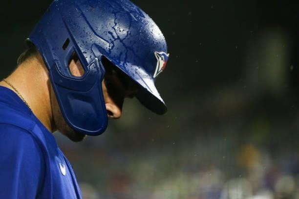 Reese McGuire of the Toronto Blue Jays stands on deck during the eighth inning against the Texas Rangers at Sahlen Field on July 16, 2021 in Buffalo,...
