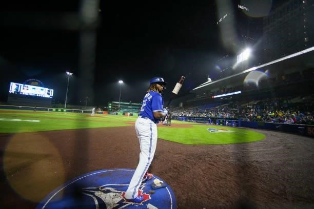 Vladimir Guerrero Jr. #27 of the Toronto Blue Jays stands on deck during the eighth inning against the Texas Rangers at Sahlen Field on July 16, 2021...