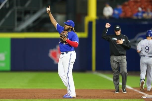 Vladimir Guerrero Jr. #27 of the Toronto Blue Jays celebrates the last out of the game against the Texas Rangers at Sahlen Field on July 16, 2021 in...