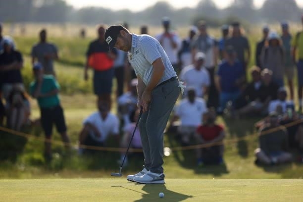 Louis Oosthuizen of South Africa putts on the 12th hole during Day Three of The 149th Open at Royal St George’s Golf Club on July 17, 2021 in...