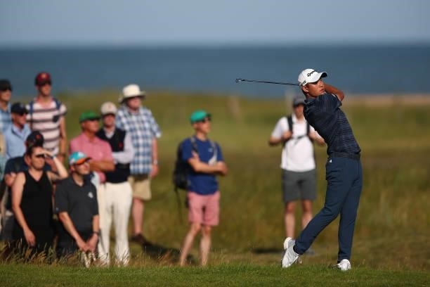 Collin Morikawa of the United States plays a second shot on the eighth hole during Day Three of The 149th Open at Royal St George’s Golf Club on July...