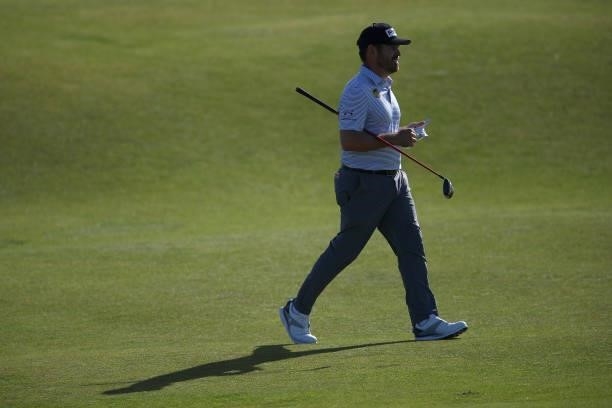 Louis Oosthuizen of South Africa walks down the seventh fairway during Day Three of The 149th Open at Royal St George’s Golf Club on July 17, 2021 in...