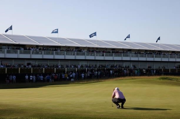 Andy Sullivan of England lines up a putt on 16th green during Day Three of The 149th Open at Royal St George’s Golf Club on July 17, 2021 in...