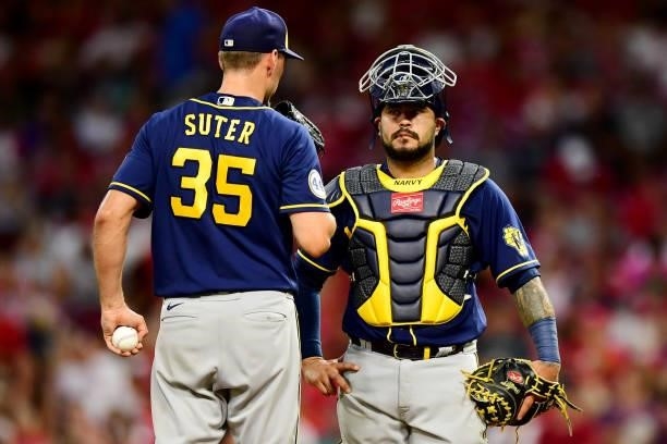 Omar Narvaez talks to Brent Suter of the Milwaukee Brewers during a game between the Milwaukee Brewers and Cincinnati Reds at Great American Ball...