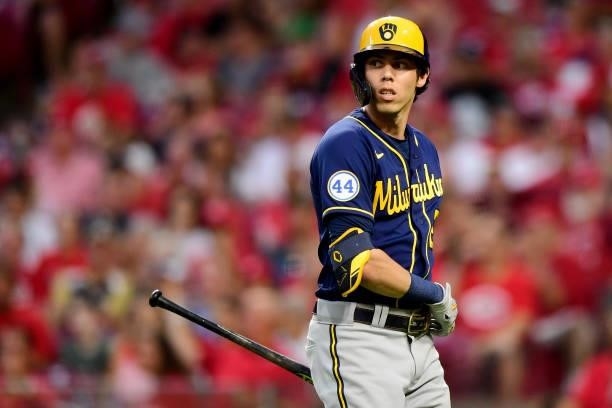 Christian Yelich of the Milwaukee Brewers reacts at-bat during a game between the Milwaukee Brewers and Cincinnati Reds at Great American Ball Park...
