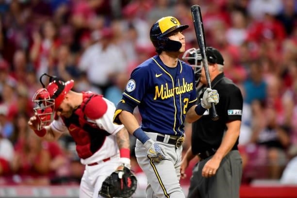 Christian Yelich of the Milwaukee Brewers reacts at-bat during a game between the Milwaukee Brewers and Cincinnati Reds at Great American Ball Park...