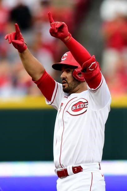 Eugenio Suarez of the Cincinnati Reds reacts after a two-run RBI double during a game between the Milwaukee Brewers and Cincinnati Reds at Great...