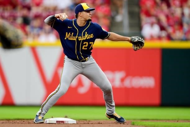 Willy Adames of the Milwaukee Brewers throws to first base during a game between the Milwaukee Brewers and Cincinnati Reds at Great American Ball...