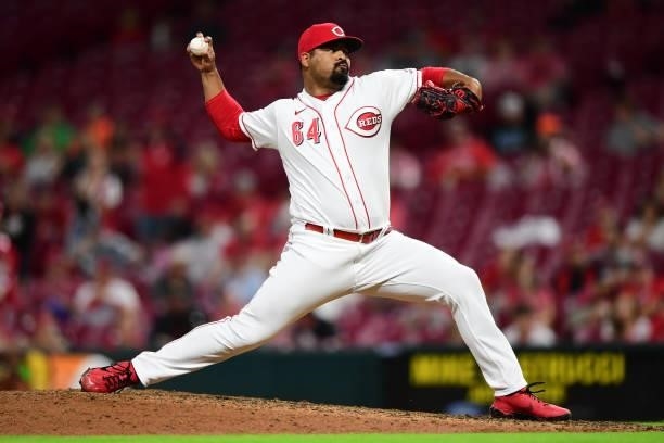 Tony Santillan of the Cincinnati Reds pitches during a game between the Milwaukee Brewers and Cincinnati Reds at Great American Ball Park on July 16,...