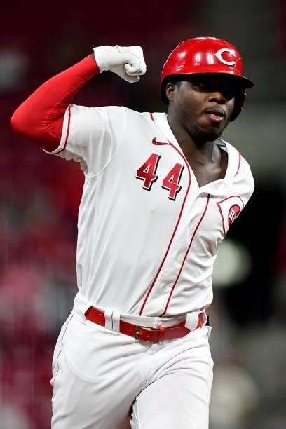 Aristides Aquino of the Cincinnati Reds celebrates his home run during a game between the Milwaukee Brewers and Cincinnati Reds at Great American...