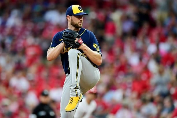 Adrian Houser of the Milwaukee Brewers pitches during a game between the Milwaukee Brewers and Cincinnati Reds at Great American Ball Park on July...