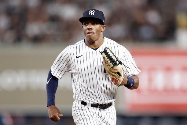 Greg Allen of the New York Yankees runs in from the outfield during the ninth inning against the Boston Red Sox at Yankee Stadium on July 16, 2021 in...