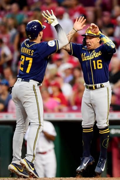 Willy Adames and Kolten Wong of the Milwaukee Brewers celebrate after Adame's two-run home run in the fifth inning during their game against the...