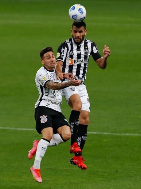 Gustavo of Corinthians fight for the ball against Junior Alonso of Atletico Mineiro during a match between Corinthians and Atletico Mineiro as part...