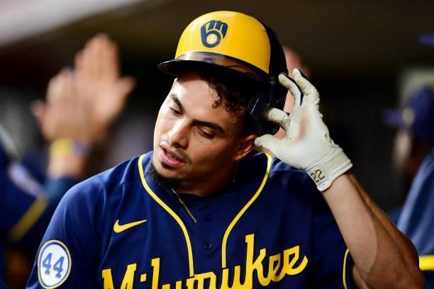 Willy Adames of the Milwaukee Brewers in the dugout during a game between the Milwaukee Brewers and Cincinnati Reds at Great American Ball Park on...