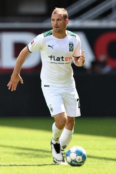 Tony Jantschke of Moenchengladbach runs with the ball during the pre-season match between SC Paderborn and Borussia Moenchengladbach at Benteler...