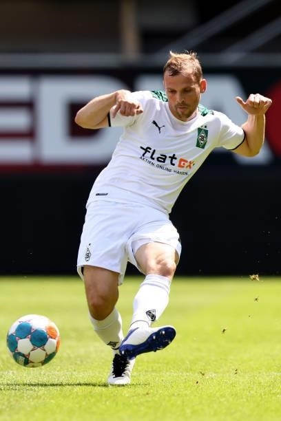 Tony Jantschke of Moenchengladbach runs with the ball during the pre-season match between SC Paderborn and Borussia Moenchengladbach at Benteler...