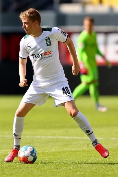 Andreas Poulsen of Moenchengladbach runs with the ball during the pre-season match between SC Paderborn and Borussia Moenchengladbach at Benteler...