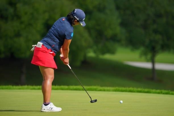 Ai Suzuki of Japan attempts a putt on the 1st green during third round of the GMO Internet Ladies Samantha Thavasa Global Cup at Eagle Point Golf...