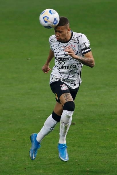 Joao Victor of Corinthians heads the ball during a match between Corinthians and Atletico Mineiro as part of Brasileirao 2021 at Arena Corinthians...