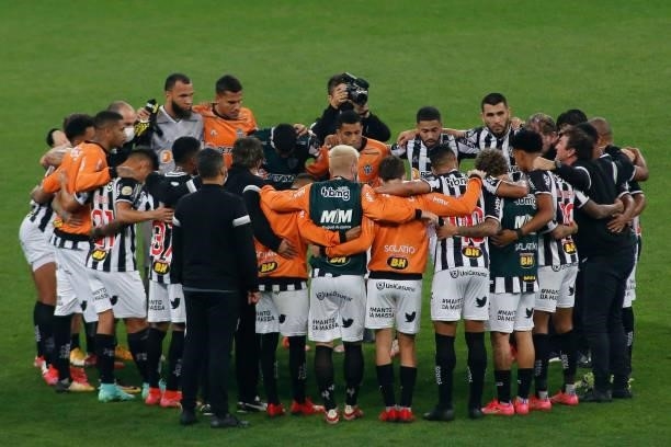 Players of Atletico Mineiro pray after a match between Corinthians and Atletico Mineiro as part of Brasileirao 2021 at Arena Corinthians stadium on...