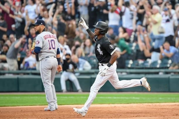 Tim Anderson of the Chicago White Sox runs the bases in front of Yuli Gurriel of the Houston Astros after Anderson's home run in the third inning at...